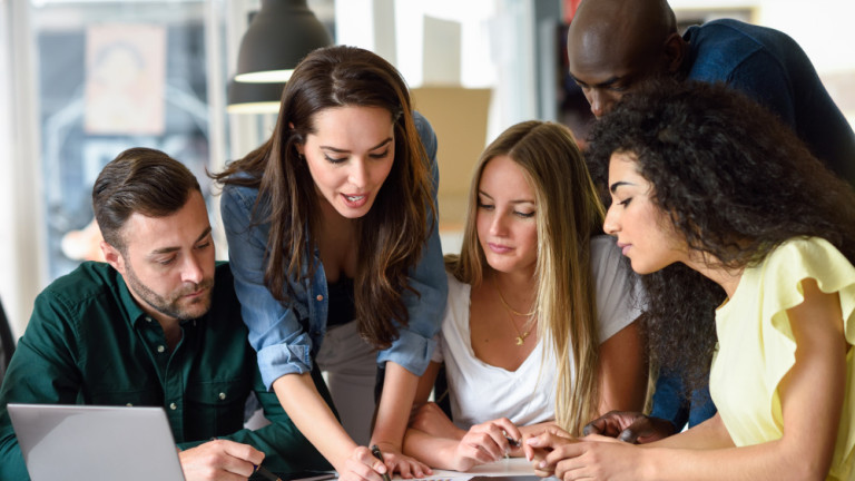 multi-ethnic-group-of-young-men-and-women-studying-indoors